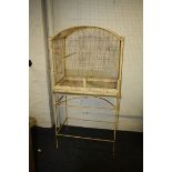 A large vintage painted parrot cage with arched top and decorative stand, 78cm wide