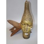 A large impressive Benin style cast brass head of a Queen Mother, 52cm high, together with an