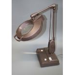 An Industrial magnifying work lamp
