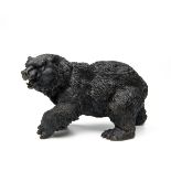 A BRONZE SCULPTURE OF A BEAR, measuring approx. 8in. x 16in. x 7in.