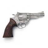 ASTRA, SPAIN A BOXED FULLY ENGRAVED .357 MAG. STAINLESS-STEEL SIX-SHOT DOUBLE-ACTION REVOLVER,