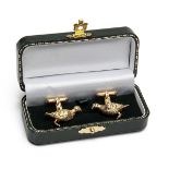 A PAIR OF SOLID SILVER GILT-PLATED GROUSE CUFFLINKS, with 925 London hall marks signed T.T.R., bar