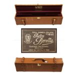 PIETRO BERETTA A TAN LEATHER DOUBLE MOTORCASE, fitted for 78cm over and under barrels, the