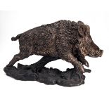 A BRONZE SCULPTURE OF A WILD BOAR, measuring approx. 14 1/2in. 25in. x 8in.