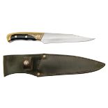A BRASS AND WOOD-HANDLED FULL TANG HUNTING KNIFE, with 8in. swaged clipped point blade, green wood
