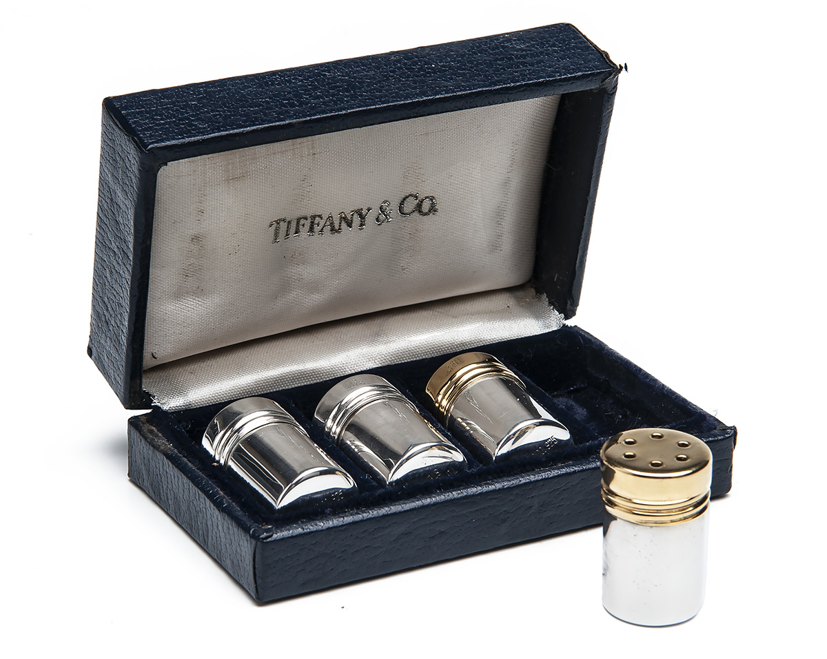 TIFFANY & CO. A SET OF FOUR STERLING SILVER SALT AND PEPPER MINATURE POTS IN THE FORM OF CARTRIDGES,