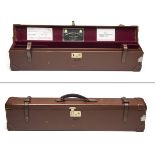 JAMES PURDEY & SONS A LEATHER SINGLE MOTOR GUNCASE, fitted for 29in. barrels, the interior lined