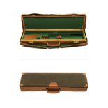 A BRASS-CORNERED OAK AND LEATHER LIGHTWEIGHT SINGLE GUNCASE, fitted for 28in. barrels, the