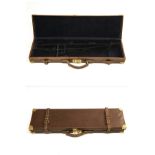 A BRASS-CORNERED LEATHER SINGLE GUNCASE, fitted for 30in. barrels, the interior lined with blue