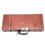 A VIRTUALLY NEW AND UNUSED ALEXANDRE MAREUIL TAN LEATHER GUNCASE FOR A DOUBLE RIFE, fitted for 24in.