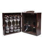 PAPWORTH FINEST LEATHER LUGGAGE A LEATHER CASED DRINKS TRAVEL BAR, fitted for three large bottles,