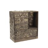 AN INTERESTING JAPANESE PINE MINIATURE CABINET DECORATED IN SHEET METAL 'MENUKI', late 19th to early