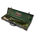 W.W. GREENER A BRASS-CORNERED LEATHER SINGLE GUNCASE, fitted for 30in. barrels, green velveteen