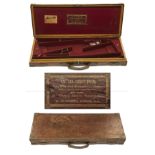 W. W. GREENER A BRASS-CORNERED OAK AND LEATHER DOUBLE GUNCASE, fitted for 30in. barrels, gold-tooled