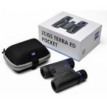 ZEISS A SET OF NEW AND UNUSED 10X25 TERRA ED POCKET BINOCULARS, with canvas belt holder and makers