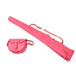 AN UNUSED PINK LEATHER SHEEPSKIN-LINED SINGLE GUNSLIP WITH MATCHING CARTRIDGE BAG, slip with leather