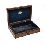 A SMALL OAK CASE FOR A POCKET TRANTER RIMFIRE REVOLVER remnants of baize lining remaining,