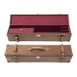 A LEATHER DOUBLE MOTOR GUN CASE, fitted for 30in. barrels, the interior lined with maroon baize,
