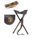 JAMES PURDEY & SONS A NEW AND UNUSED LIGHTWEIGHT WOOD AND LEATHER TRIPOD SEAT, with leather carry