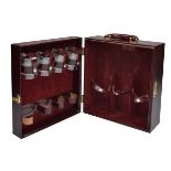 PAPWORTH FINEST LEATHER LUGGAGE A LEATHER CASED DRINKS TRAVEL BAR, fitted for three large bottles,