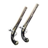 R. WHEELER, LONDON AN IMPRESSIVE EARLY PAIR OF 20-BORE FLINTLOCK BRASS-BARRELLED HORSE-PISTOLS, no