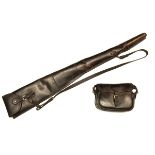 A FLEECE-LINED LEATHER GUNSLIP AND LEATHER CARTRIDGE BAG, the slip suitable for a 25in. barrelled