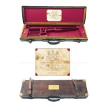 JAMES WOODWARD & SONS A BRASS-CORNERED OAK AND LEATHER SINGLE GUNCASE, fitted for 29in. barrels (