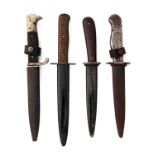 FOUR GERMAN WORLD WAR ONE AND TWO BOOT or TRENCH-KNIVES, ONE SIGNED 'PUMA', various blade types,