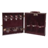 PAPWORTH FINEST LEATHER LUGGAGE A LEATHER CASED DRINKS TRAVEL BAR, fitted for three large bottles,