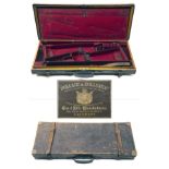 HOLLAND & HOLLAND (label for gun no. 25746/7) A BRASS-CORNERED OAK AND LEATHER DOUBLE GUNCASE,