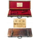 STEPHEN GRANT & SONS A BRASS-CORNERED OAK AND LEATHER DOUBLE GUNCASE, fitted for 30in. barrels,