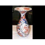 An antique Imari style vase, with flared rim - 48c