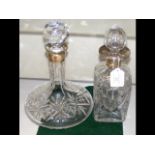 A silver mounted cut glass decanter with stopper a