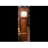 An oak cased thirty hour Grandfather clock with painted s