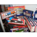 Selection of boxed Lima and Bachmann rolling stock