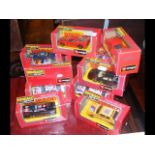 Boxed Burago die-cast vehicles