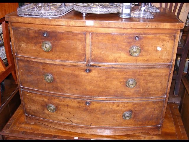 Antique bow fronted chest of drawers