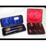 Silver knife and fork in presentation case, togeth