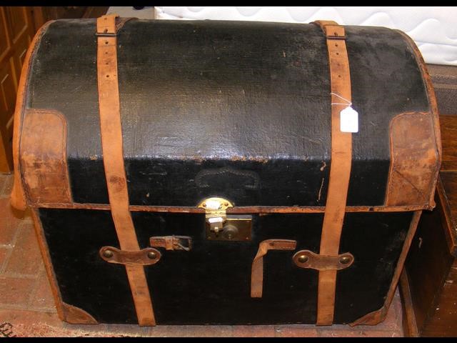 Antique dome top travelling trunk