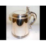 A silver three pint lidded tankard, London 1933 -