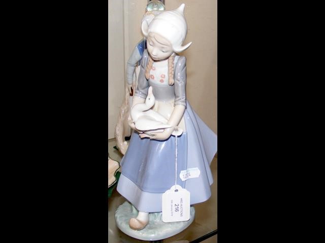 Lladro figure of girl carrying duck 26cm