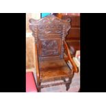 A Victorian carved Wainscot chair