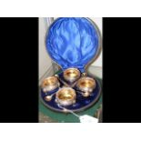 A cased set of four silver and gilt table salts wi