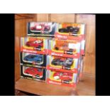 Selection of boxed Burago die-cast vehicles