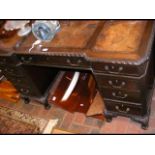 Mahogany pedestal desk with brown leather top and