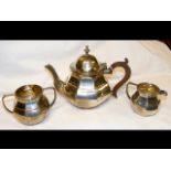 A three piece silver teaset by Asprey of London