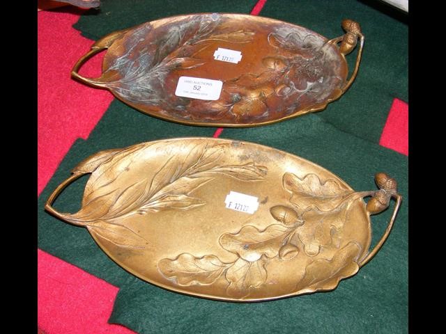 A pair of bronze French acorn dishes - 26cm long