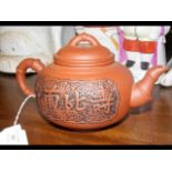 A Chinese terracotta teapot