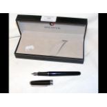 A boxed Sheaffer fountain pen