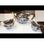 A silver half fluted bachelor's teaset - gross tot